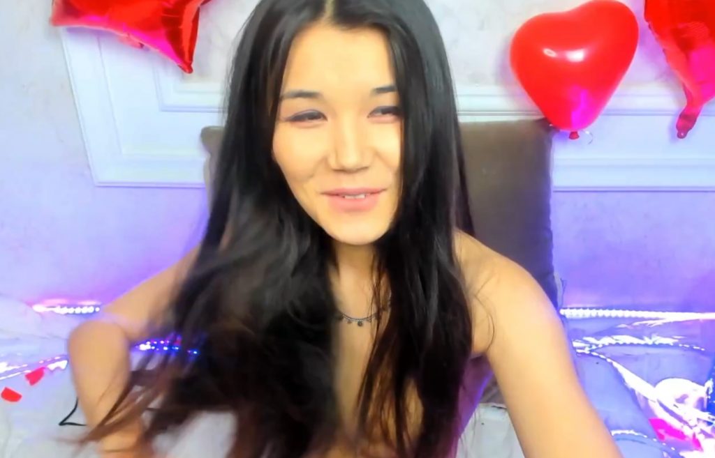 smiling Asian cam girl